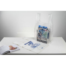 Journal transportant des sacs tubulaires en plastique